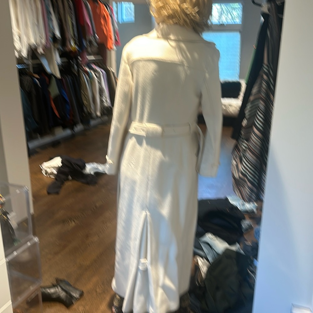 Ralph Lauren long cream colored coat. Looks great on. Rich looking !